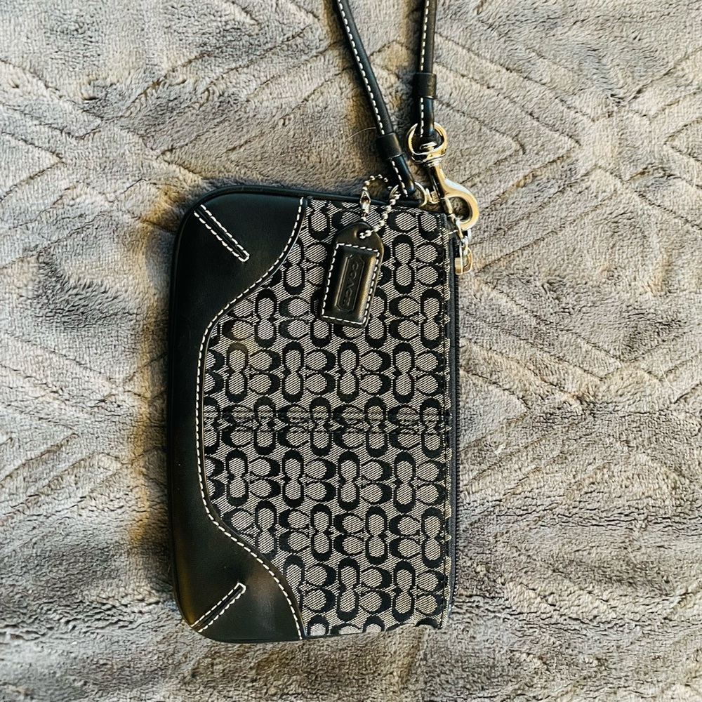Coach signature print black and white wristlet